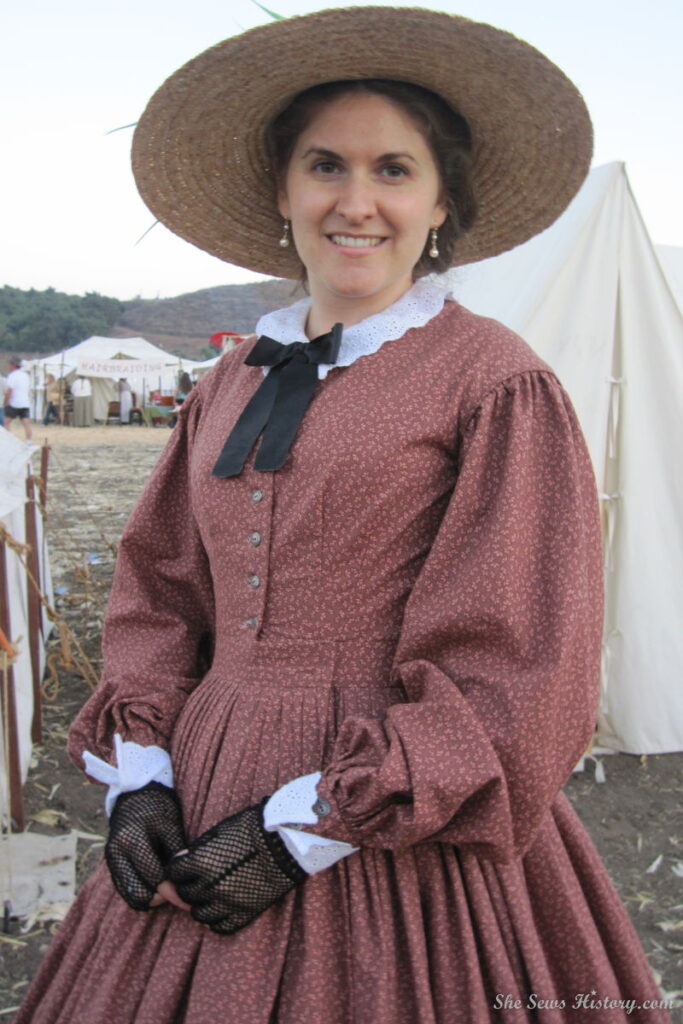 Brown Civil War Reenacting Dress with Straw hat and fingerless net gloves