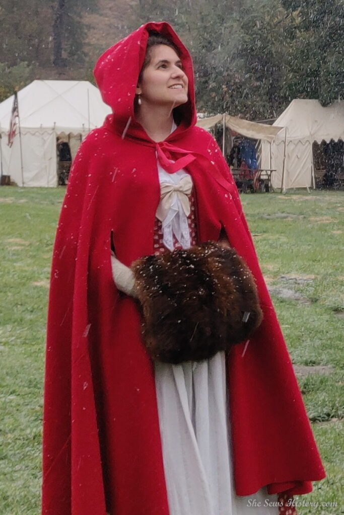 18th Century Red Riding Hood Cape with Fur Muff in snow